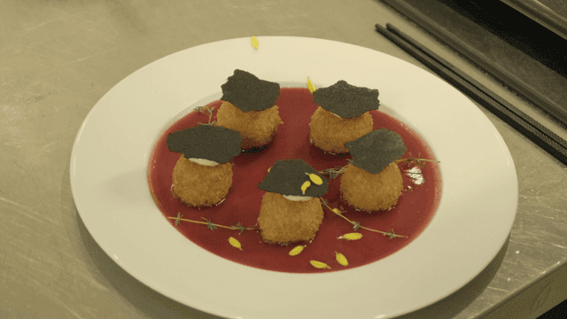 Plating of gourmet dish with sauce