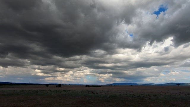 Clouds Flowing Over a Quiet Meadow