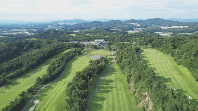 Aerial view of a lush green golf course