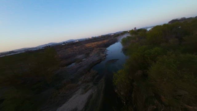 Calm Lake Flowing in the Middle of the Wilderness