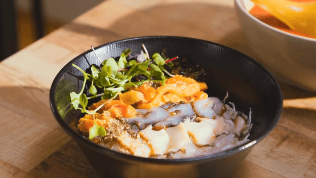 Fresh vegetables and seafood in a bowl