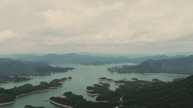 Vast lake surrounded by lush mountains
