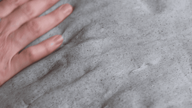 Hands kneading dough