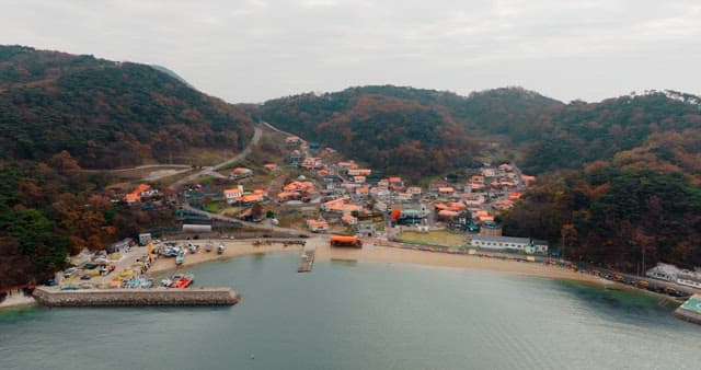 Autumn-Colored Forests and Coastal Villages