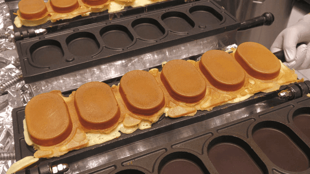 Brown egg bread baked on iron plate