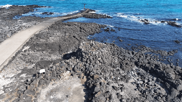 Rocky coastline with a pathway by the sea