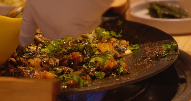 Delicious Fried Rice Cooked on a Hot Iron Plate