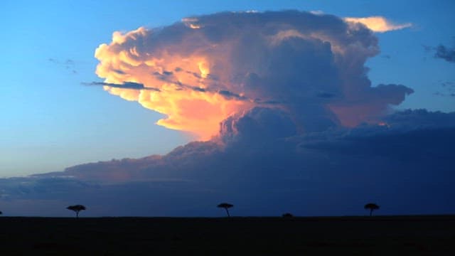 Majestic Sunset Clouds over Savanna