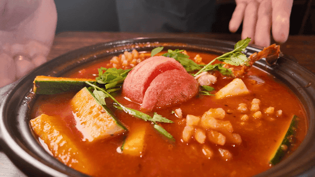 Tomato seafood hot pot in red broth