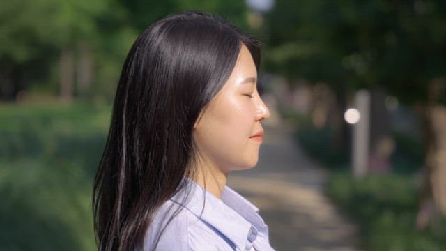 Woman enjoying a sunny day outdoors