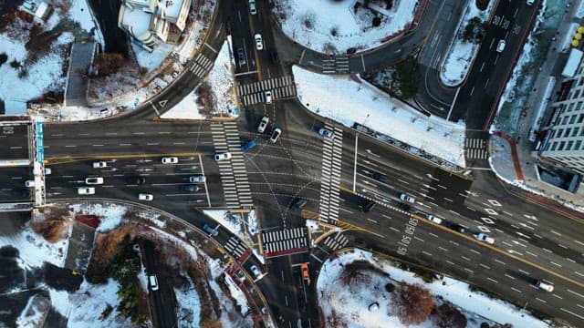 Snow-dusted Urban Intersection From Above