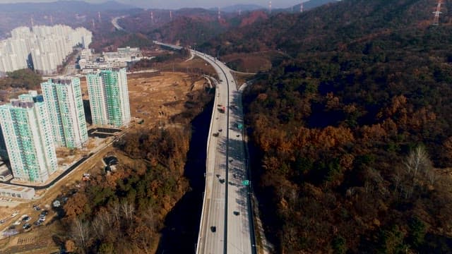 Highway by Urban Apartments on a Clear Fall Day