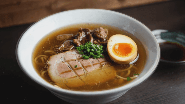 Bowl of ramen with boiled egg and pork chashu