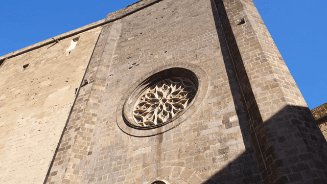 Historic wall with rose window