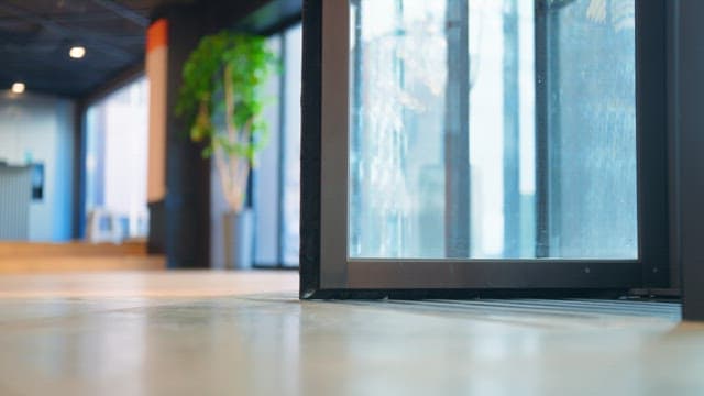 Person exiting through revolving door