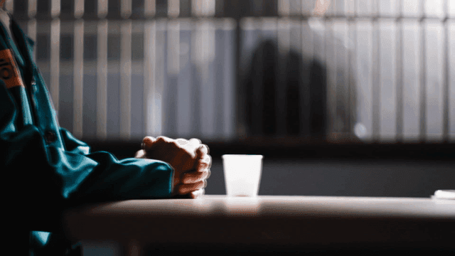 Detectives interrogating prisoner