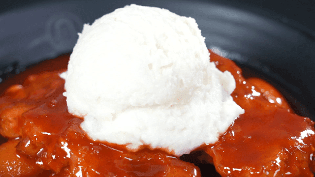 Spicy tteokbokki topped with potato salad