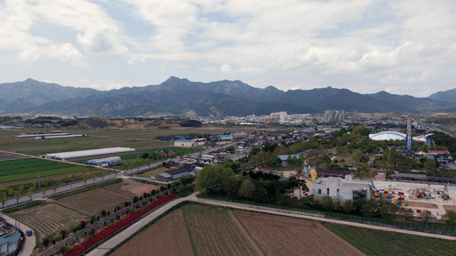 Rural landscape with fields and mountains