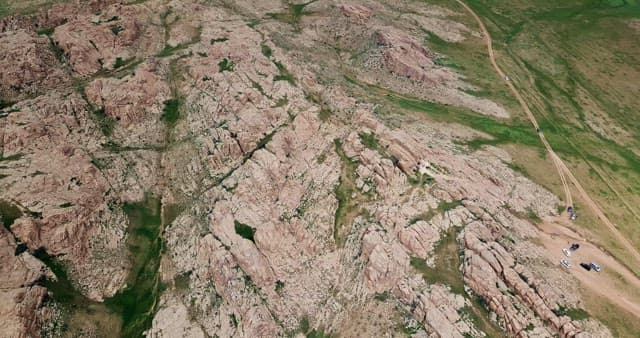 Rocky terrain with scattered greenery