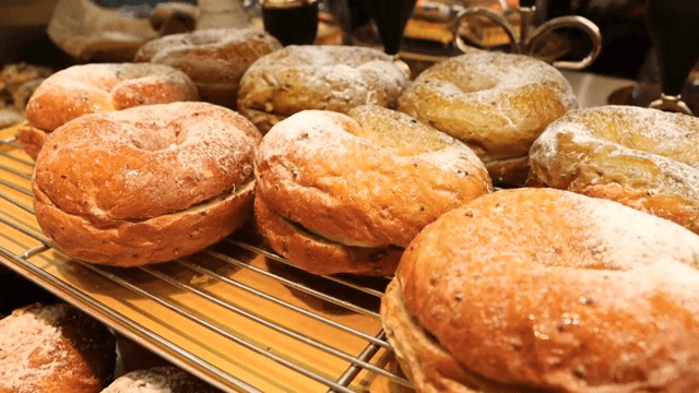 Freshly baked bagel displayed on a cooling rack
