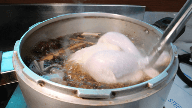 Pot for boiling chicken with medicinal herbs