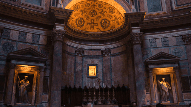 Inside magnificent cathedral with statues