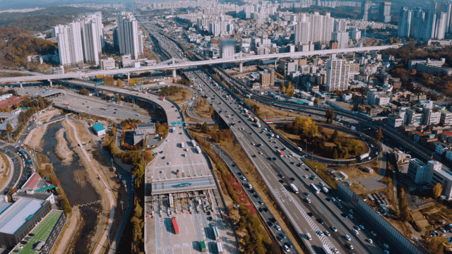 A bustling city with highways and skyscrapers