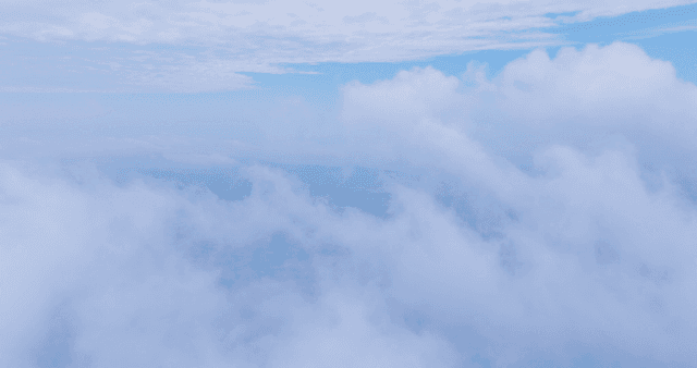 Clouds covering a vast landscape