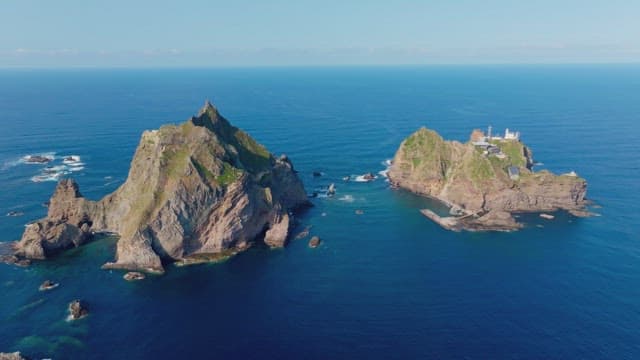 Rocky islands surrounded by blue ocean