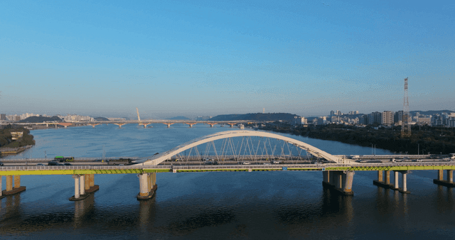 City skyline and bridges over river