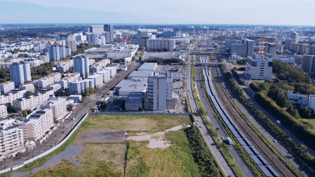 Sprawling city with roads and buildings