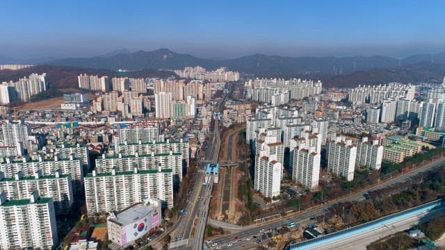 Bustling Cityscape with Many Residential Complexes