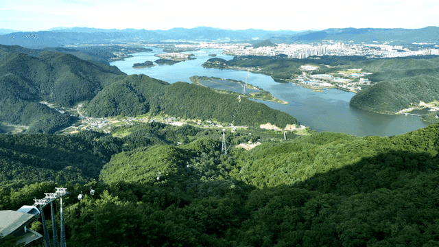Panoramic view of mountains and city