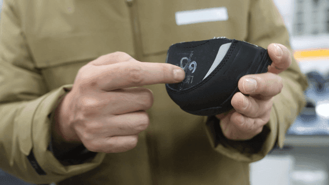 Safety shoe sole inspection at workplace