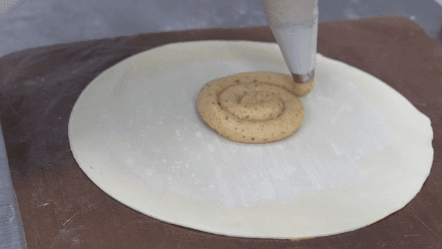 Almond cream on top of round dough