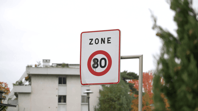 Speed limit signs on road