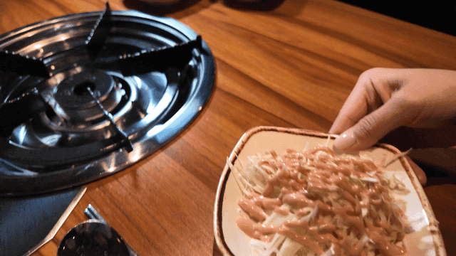 Cayonnaise salad prepared on restaurant table