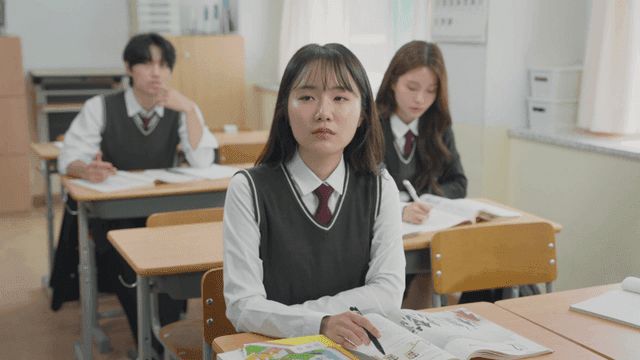 Students studying attentively in class