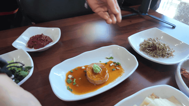 Various Korean side dishes on a table