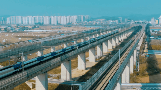 High-speed train on elevated tracks