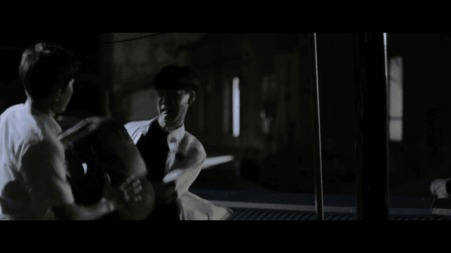 Two students in a nighttime confrontation