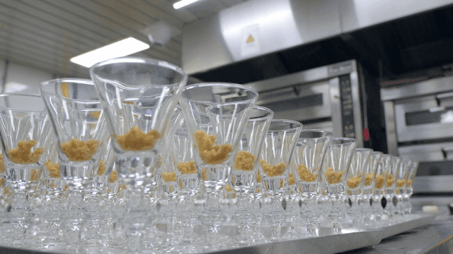 Glass with cookie pieces in kitchen