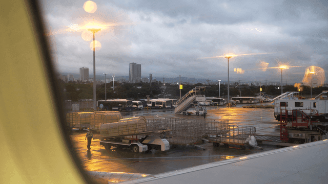 Airport tarmac with buses and equipment