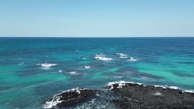 Clear blue ocean with gentle waves