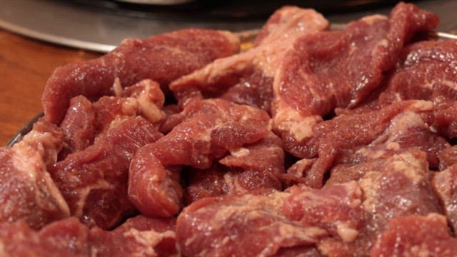 Grilling Delicious Meat on a Grill from Restaurant