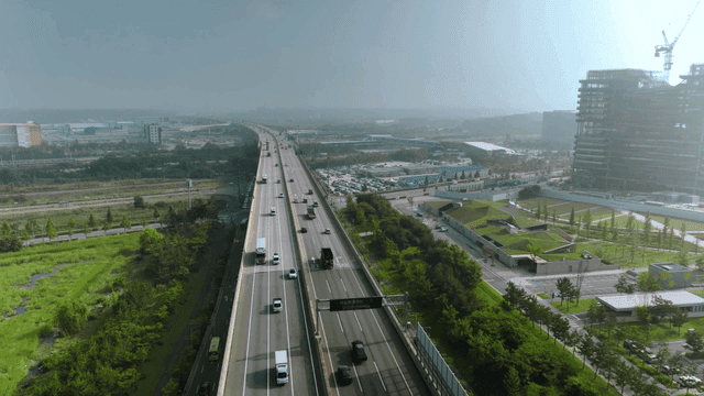 Highway with vehicles and plains scenery