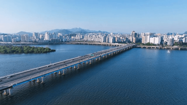 City view and bridge over wide river