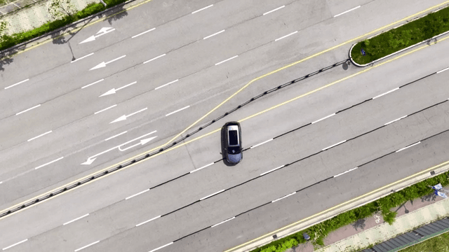 Car standing on an empty highway
