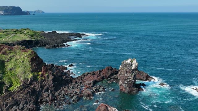 Scenic Coastal Landscape with Lush Cliffs