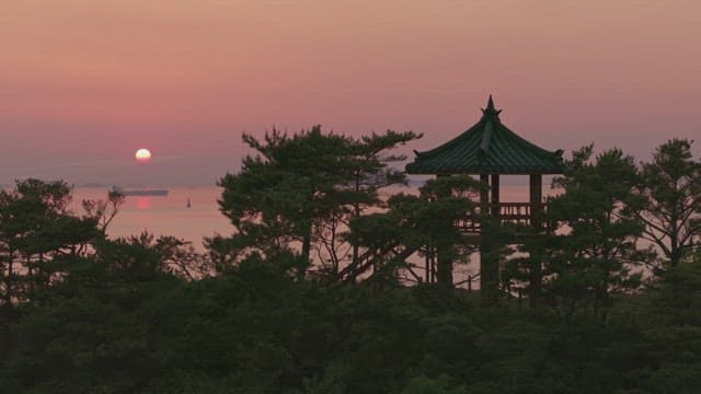 Sunset view with an old pavilion